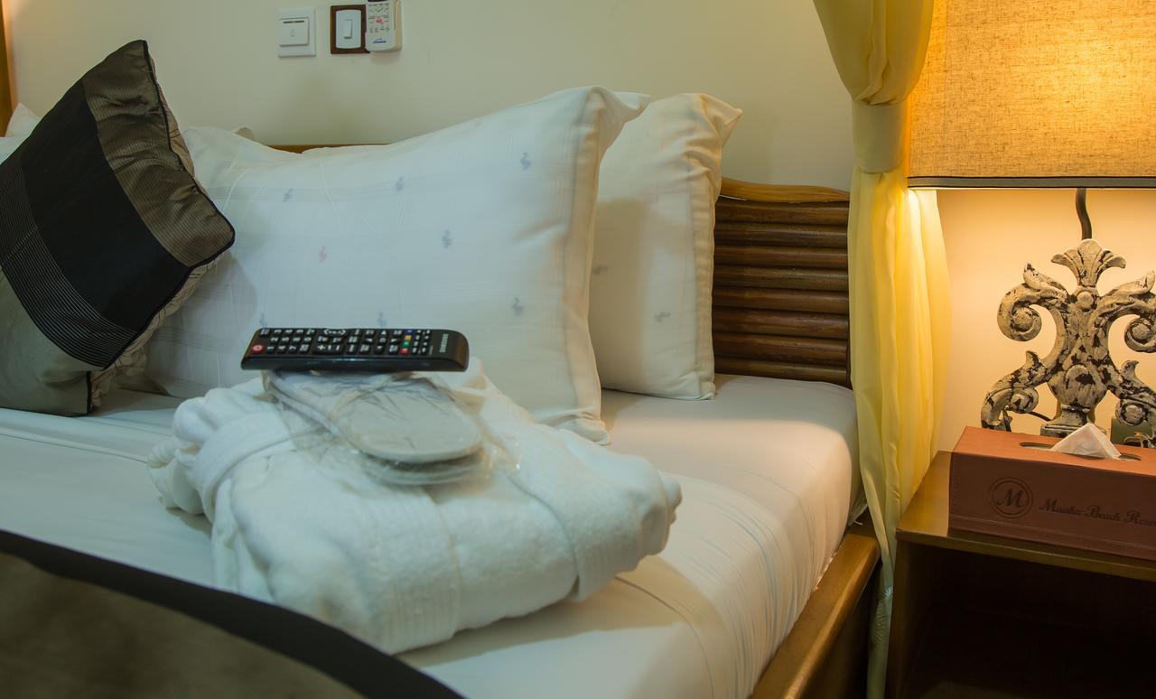 Maaha Beach Resort Anochi Bagian luar foto