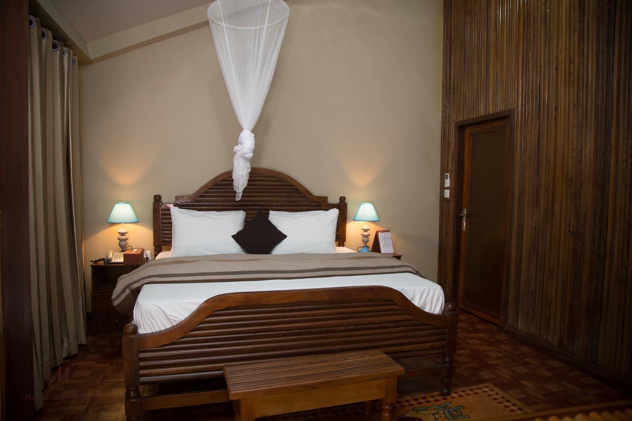 Maaha Beach Resort Anochi Bagian luar foto